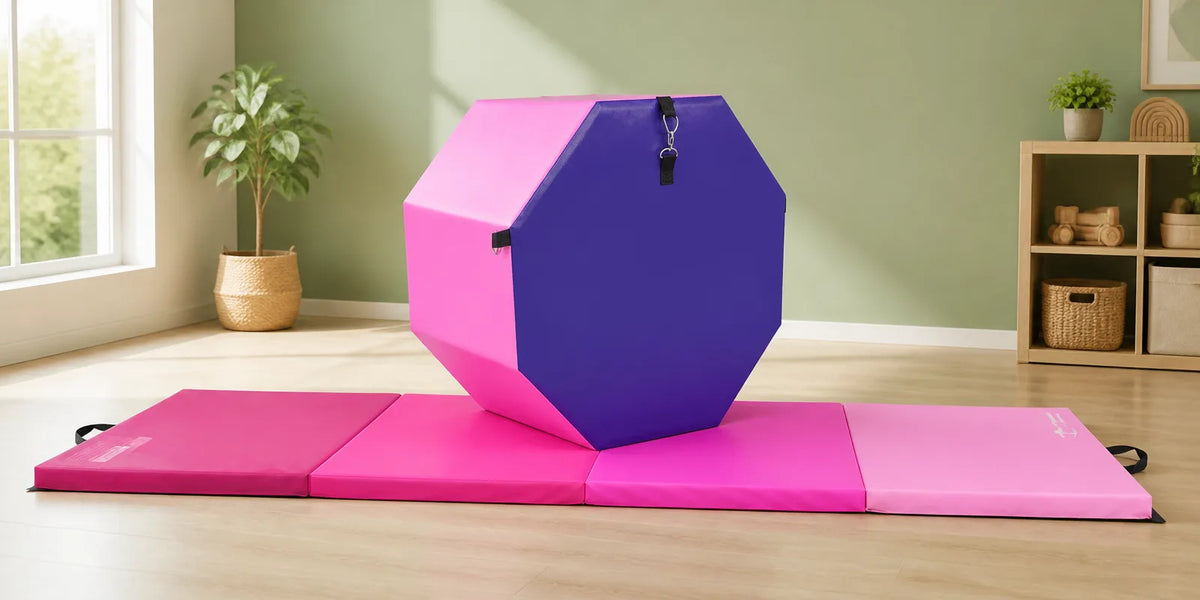 Pink octagon tumbling trainer mat in a bright home playroom