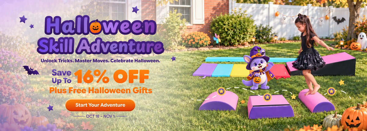 Girl playing on colorful foam Halloween skill adventure blocks in backyard