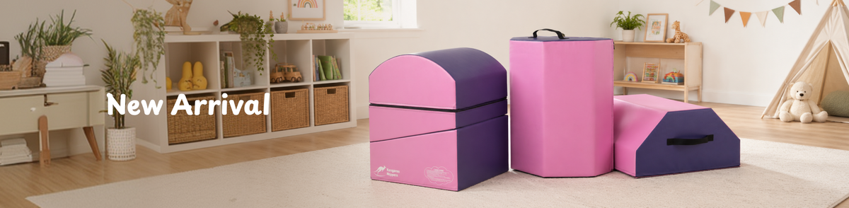 Pink and purple foam play set with arch cylinder and ramp in a playroom